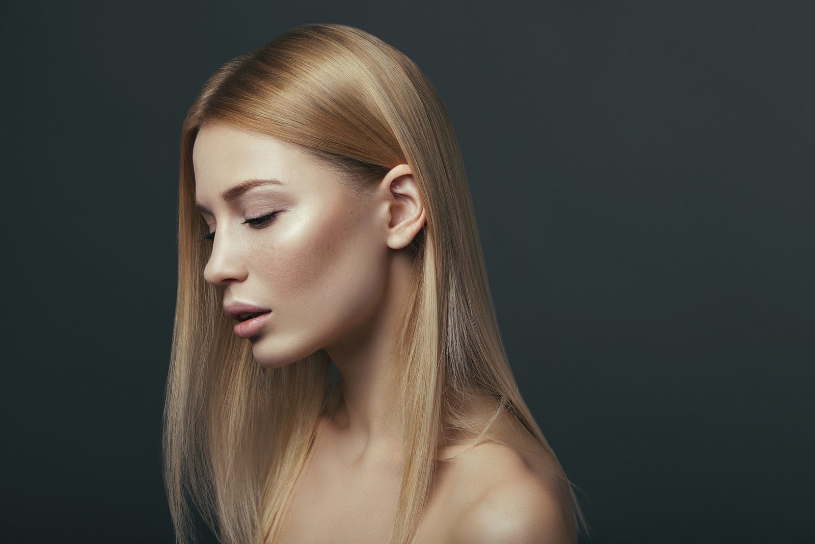 Woman resting while considering rhinoplasty in NYC